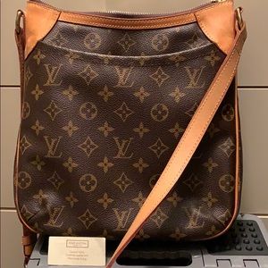 Authentic Louis Vuitton cross body bag